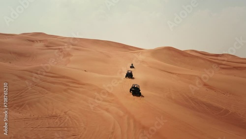 Wallpaper Mural Aerial view of tourists riding dune buggies and quad bike in Dubai desert dunes UAE Torontodigital.ca