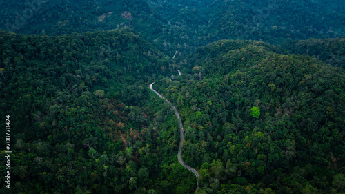 aerial view form drone winding road in the green valley in the north of thailand,