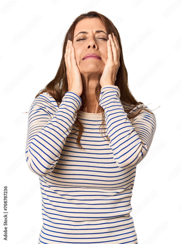 Middle-aged woman portrait in studio setting crying, unhappy with something, agony and confusion concept. Middle-aged woman portrait in studio setting crying, unhappy with something, agony and confusion concept.