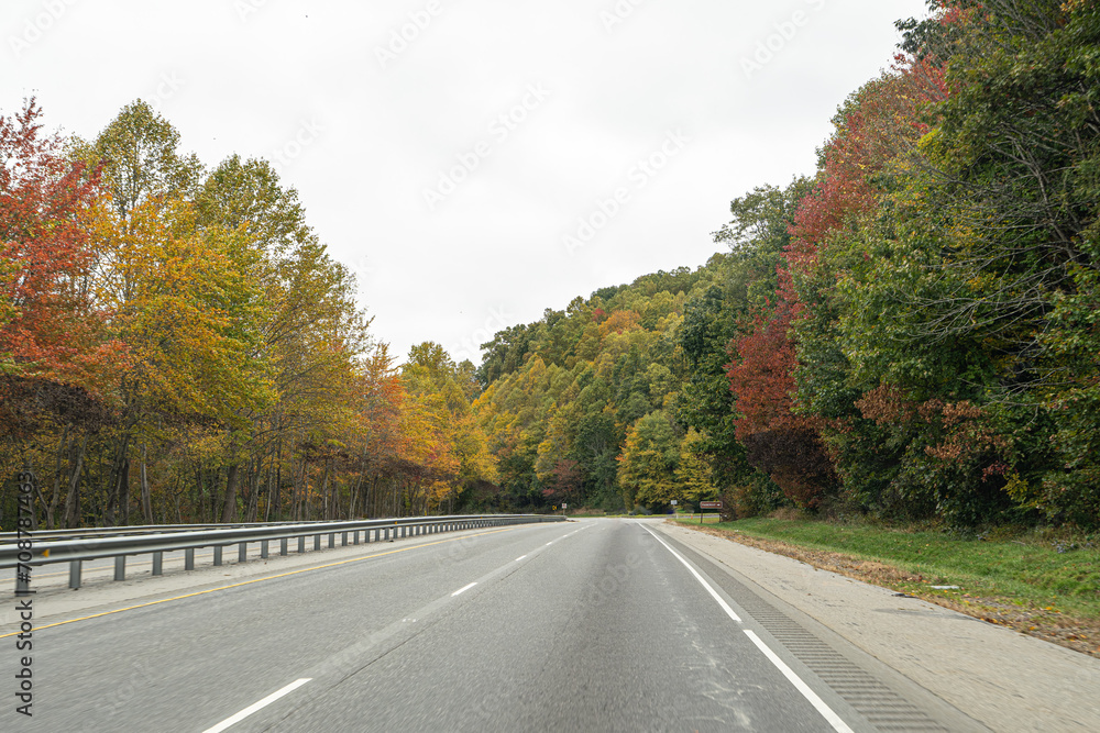 A Stunning view to the road of autumn A Stunning view to the road of autumn
