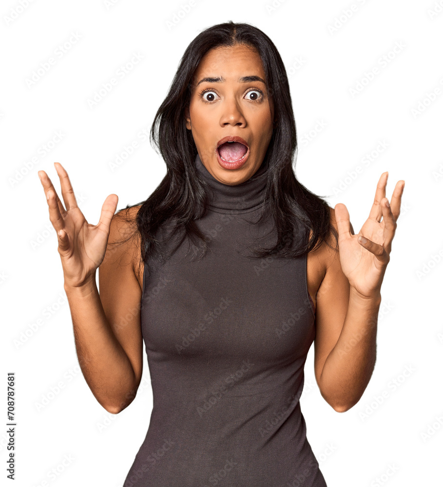 Young Filipina with long black hair in studio screaming to the sky, looking up, frustrated. Young Filipina with long black hair in studio screaming to the sky, looking up, frustrated.
