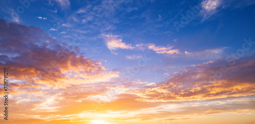 Fototapeta Naklejka Na Ścianę i Meble -  Sunset clouds are gathering. Panoramic sunrise or sunset sky with clouds. Sunset Sky on Twilight in the Evening with Sunset. Cloud Nature Sky Backgrounds. Sky Sunrise, Dusk clouds.