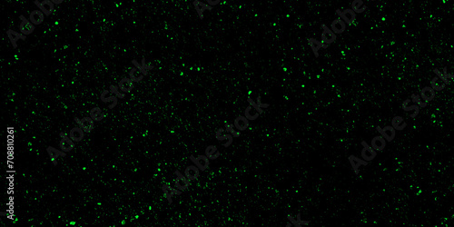 Green bokeh abstract background. Modern realistic seamless glitters background. Colourful glowing Christmas garland with blur background and bokeh.	