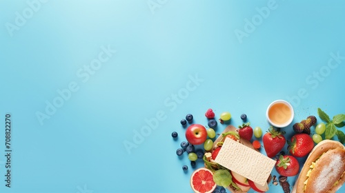 Captivating School Break: Nourishing Lunchbox Scene with Colorful Sandwiches, Fresh Fruits, and a Stylish Rucksack on Blue Background - Perfect for Text and Advertising
