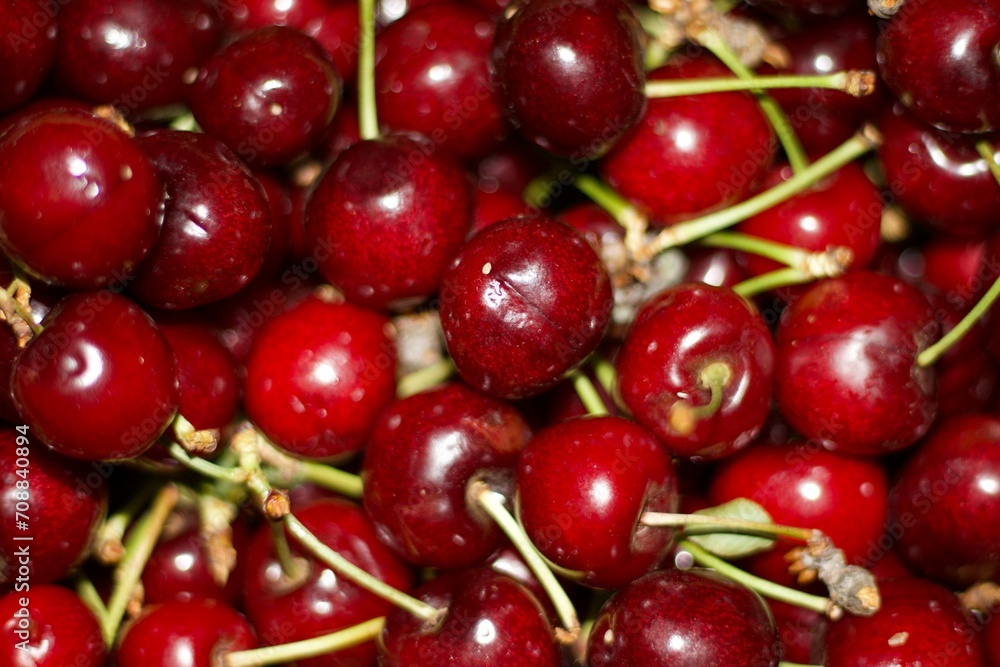 ripe cherries inside a cardboard box, seasonal fruits ripe cherries inside a cardboard box, seasonal fruits