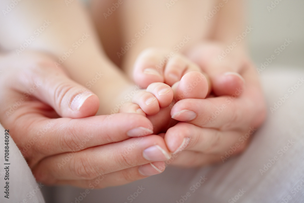 Love, mother and hands with baby or feet for development, nurture and bonding in nursery of apartment. Family, woman or newborn toes with relax, support or care for relationship or motherhood in home - obrazy, fototapety, plakaty 