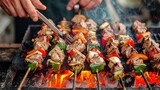 Grilled meat skewers shish kebab on portable grill.