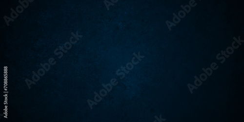 Dark Blue grunge wall grungy backdrop texture, watercolor painted mottled blue background, colorful bright ink and watercolor textures on black paper background.