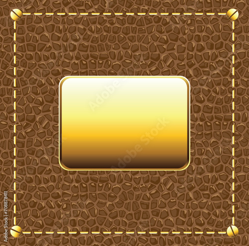 Brown leather background with gold plate