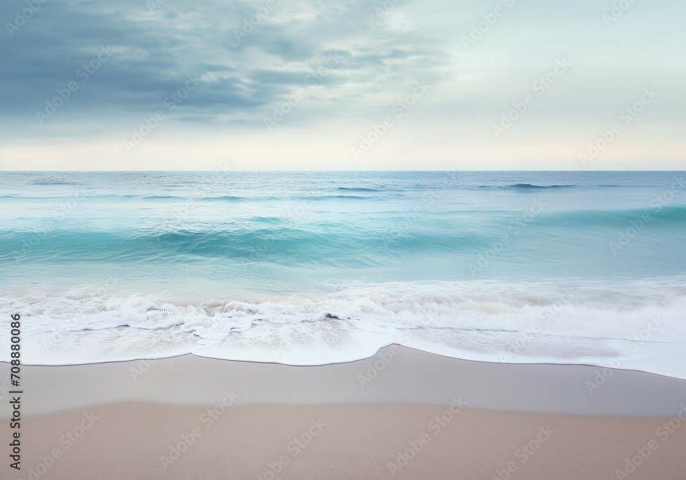 Fototapeta premium Sandy beach in nasty weather, stormy landscape. Deep blue sea under the clouds. Stunning picturesque beach with fine sand, dark gray cloudy weather and big waves. Foaming sea water with bronze sand. 