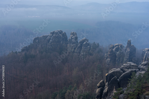 An early morning in mountain. Schrammsteine - group of rocks are a long, strung-out, very jagged in the Elbe Sandstone Mountains located in Saxon Switzerland in East Germany. © Sergey Kohl