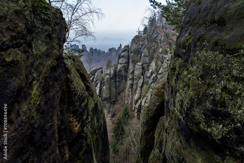 An early morning in mountain. Schrammsteine - group of rocks are a long, strung-out, very jagged in the Elbe Sandstone Mountains located in Saxon Switzerland in East Germany.