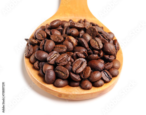 Roasted coffee beans on woo...