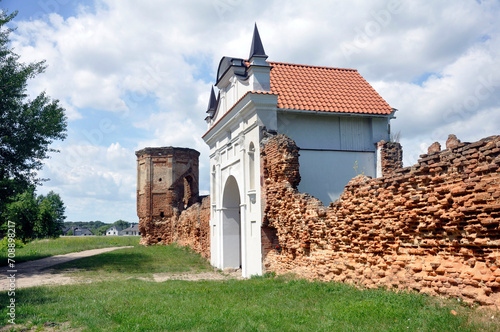 Restored entrance gate and remains of the walls of the Carthusian monastery of 1648-1666 in the town of Bereza, Belarus. photo