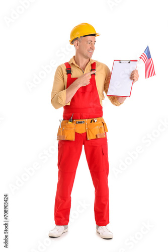 Mature worker pointing at U...