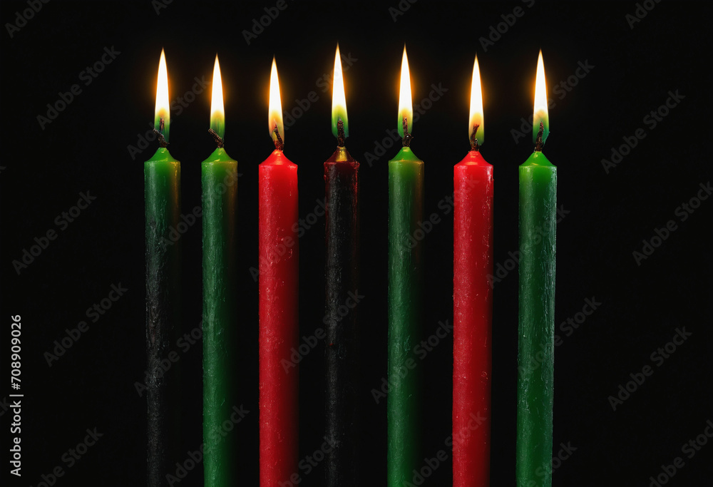Kwanzaa festival concept with seven candles red, black and green on black background, copy space Kwanzaa festival concept with seven candles red, black and green on black background, copy space