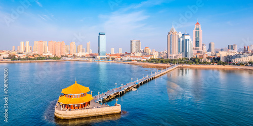 Aerial photography of Qingdao Zhanqiao Huilan Pavilion and urban skyline in Shandong, China photo