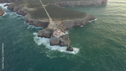 Aerial video of the lighthouse and cliffs at Cape St. Vincent. The sea view of the Algarve