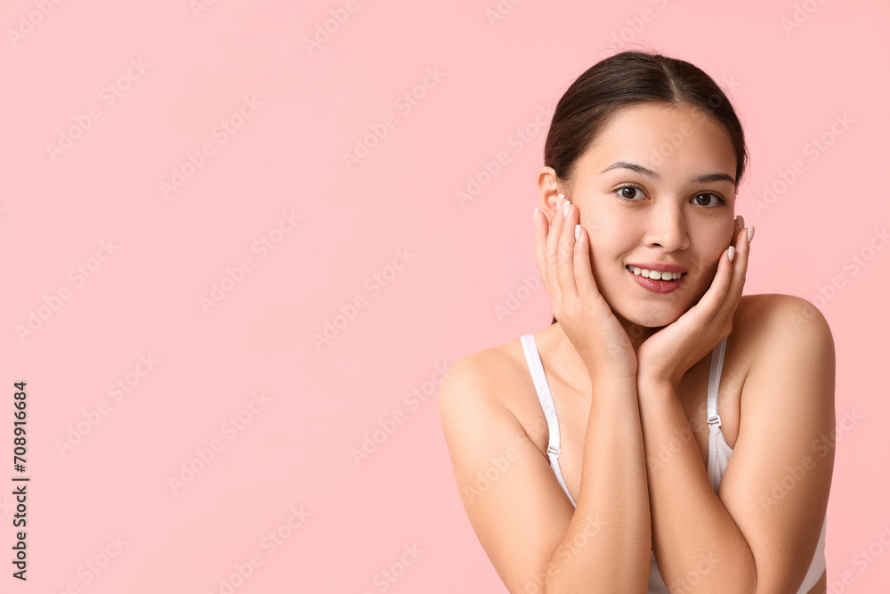 Beautiful young Asian woman on pink background Beautiful young Asian woman on pink background