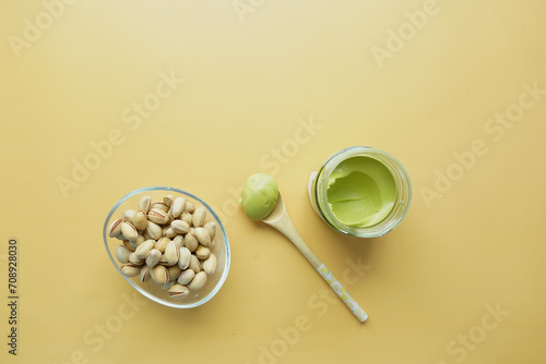 top view of cashew nuts and cream in a container 