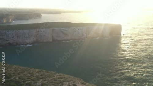 Aerial video of the lighthouse and cliffs at Cape St. Vincent. The sea view of the Algarve