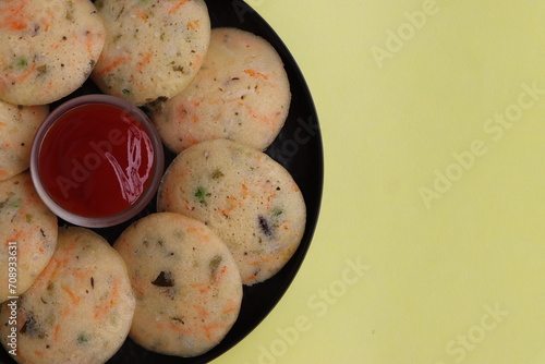 Rava Idli or semolina idli or steamed cakes made with semolina, yogurt, spices, veggies, an Indian breakfast