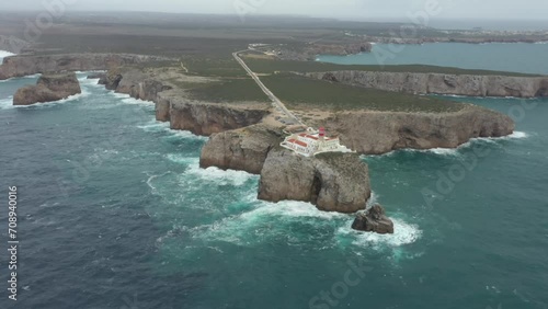 Aerial video of the lighthouse and cliffs at Cape St. Vincent. The sea view of the Algarve