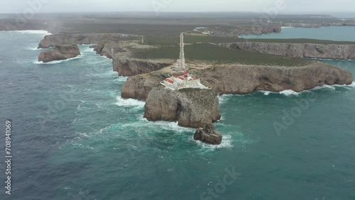 Aerial video of the lighthouse and cliffs at Cape St. Vincent. The sea view of the Algarve