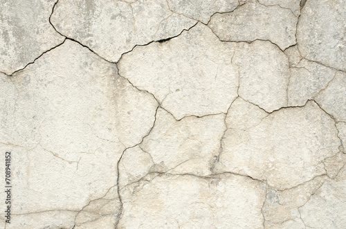 Old damaged cement block with cracks. For the apocalyptic design of old ruined architecture. Tile texture for your design