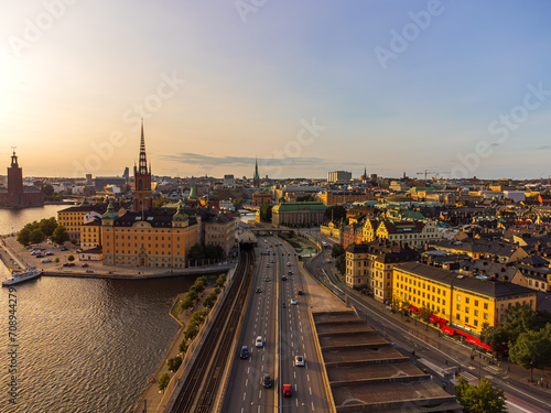 The main central road through Stockkholm central city, passing near the old Town and Riddarholmen. The district of Södermalm above. Drone view, late august.