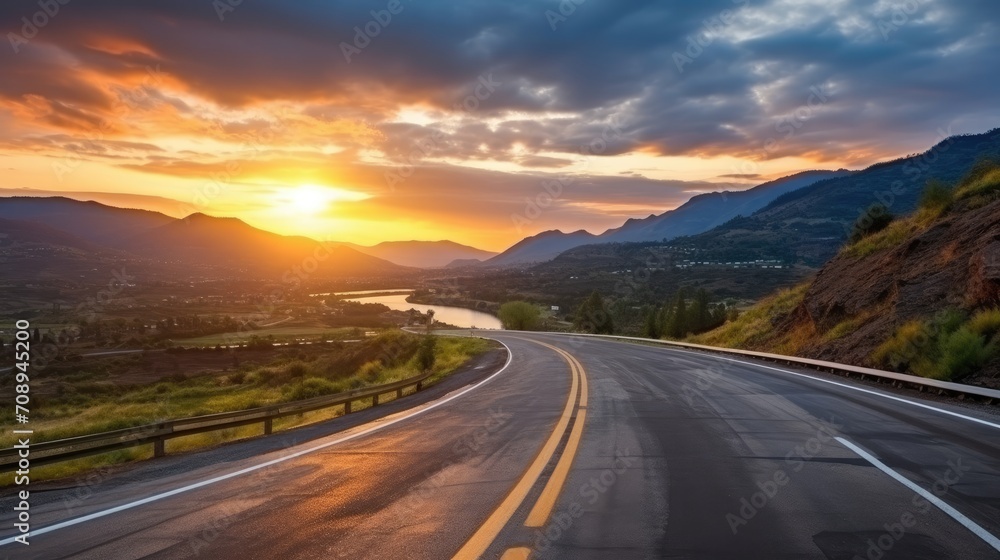 Naklejka premium Road and mountain natural landscape at sunset
