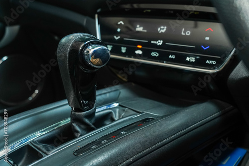 Automatic transmission gearshift stick, Close up of the automatic gearbox lever, black interior car photo