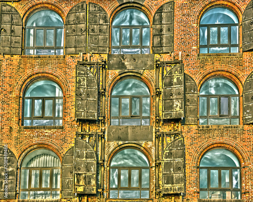 Detail of an old brick wall facade building in Red Hook, Brooklyn, New York