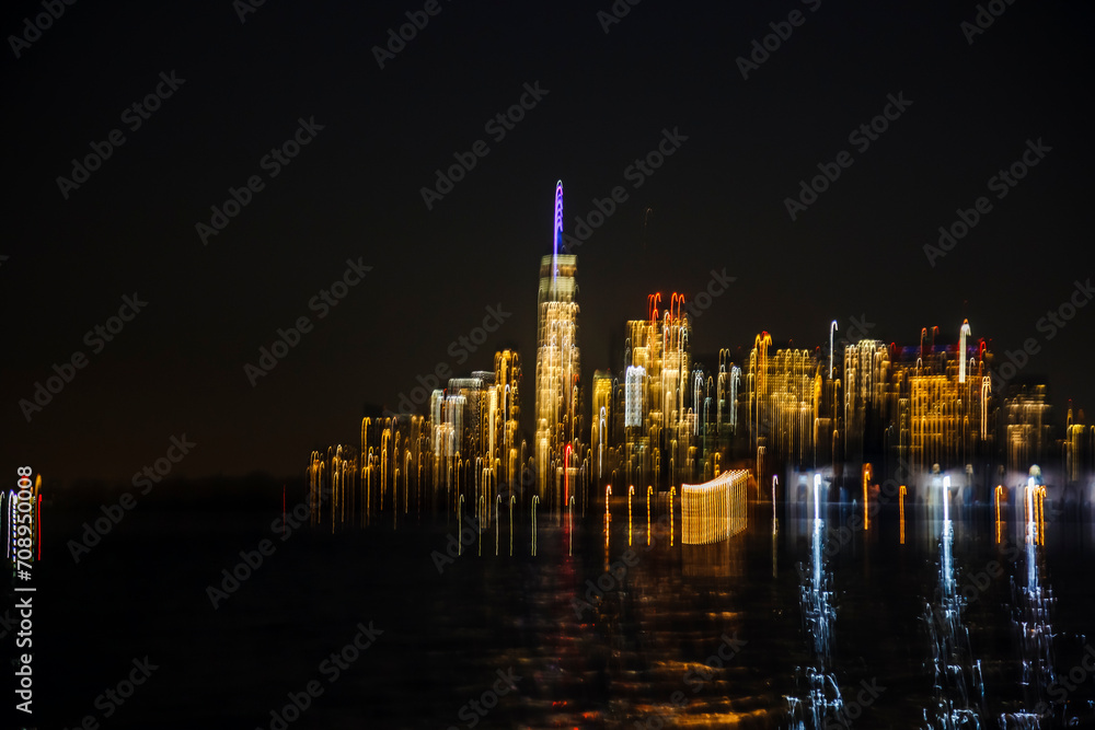 Fototapeta premium Abstract Long exposure lighting of Manhattan, from Hudson bay, NYC, USA