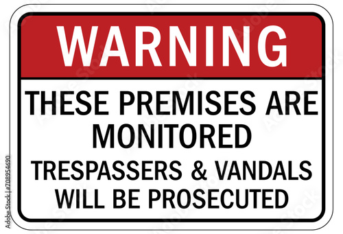 No vandalism warning sign and labels these premises are monitored. Trespassers and vandals will be prosecuted