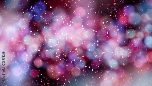 Colorful blurred bokeh with hearts loop slow motion background. Valentine's day holidays copy space greeting card.