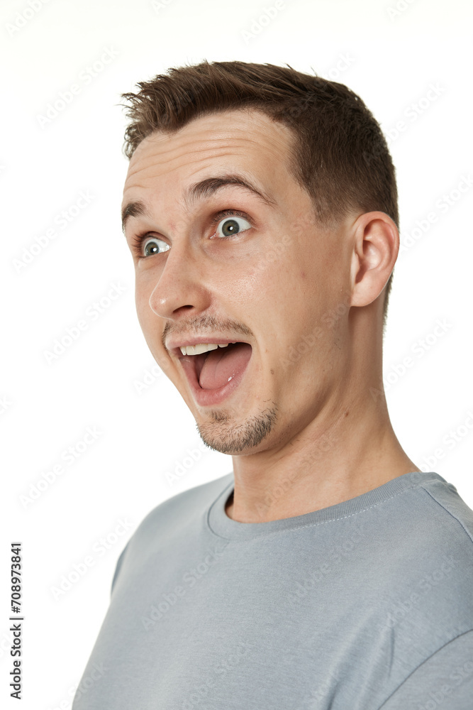 surprised guy looking at camera on white studio background surprised guy looking at camera on white studio background