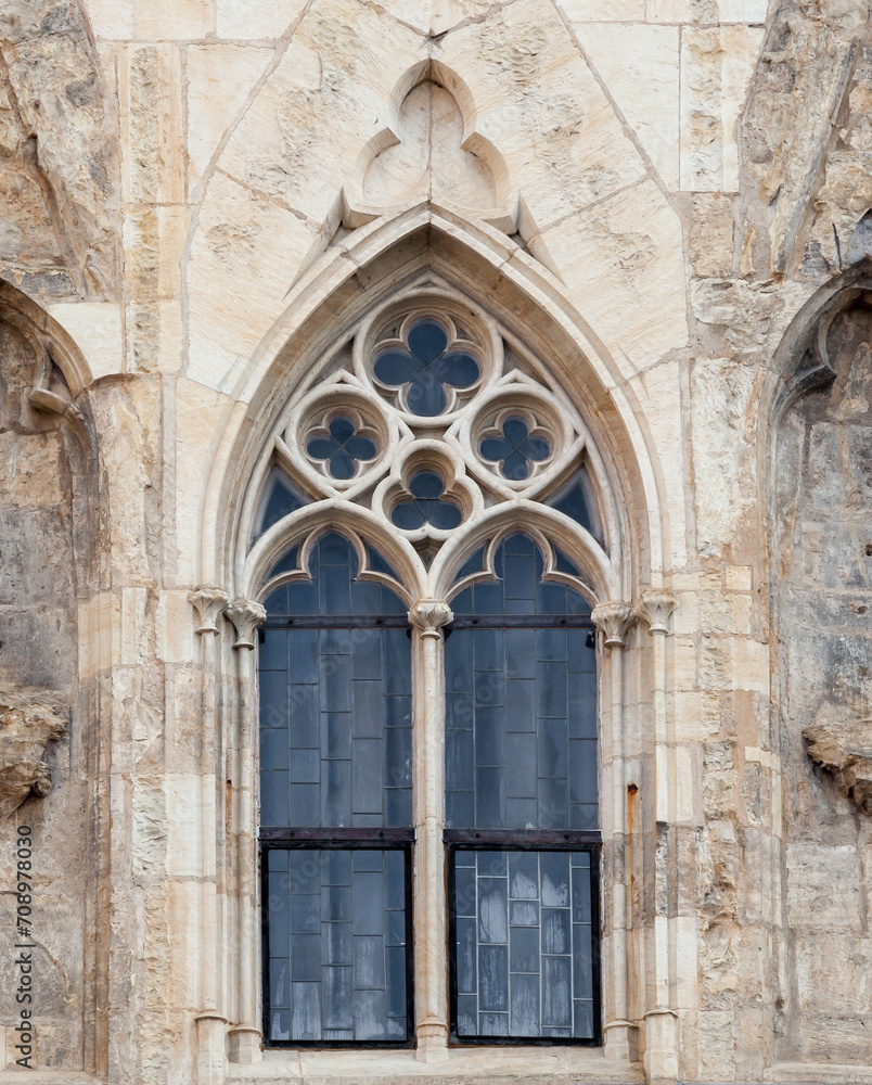 Ornamented window of a cathedral in gothic style