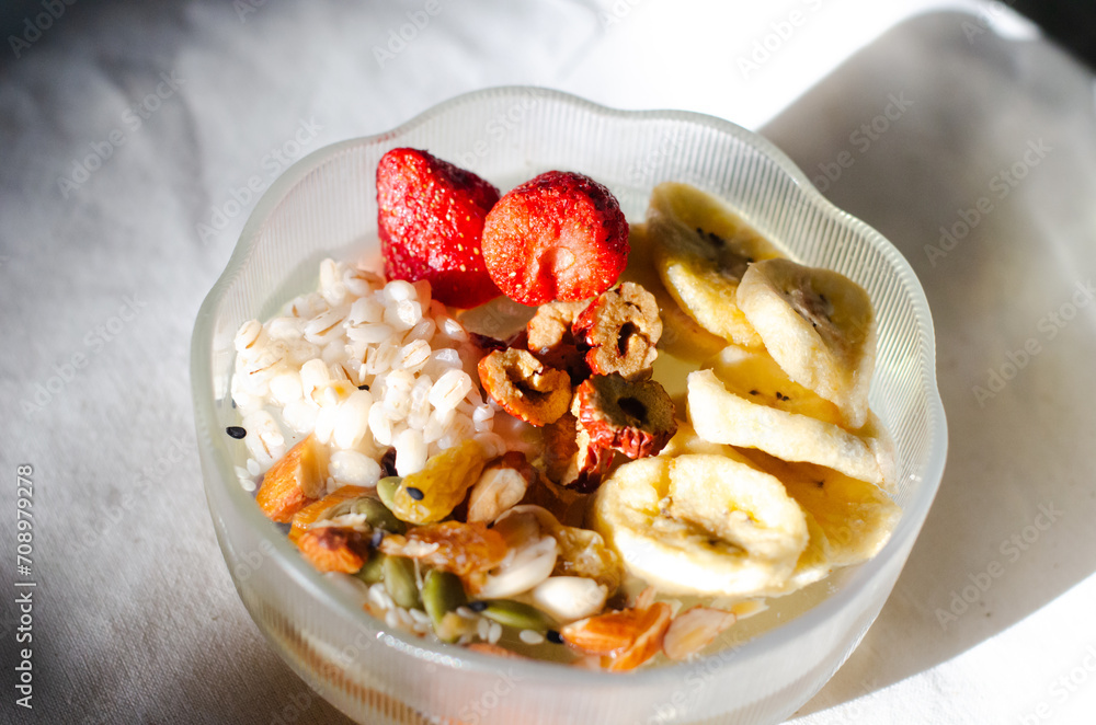 Homemade yogurt topped with sauce, fresh fruit and lots of grains. Homemade yogurt topped with sauce, fresh fruit and lots of grains.