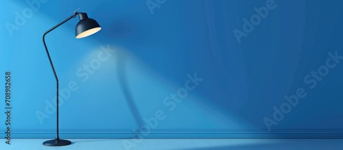 Blue wall mockup with lamp photo