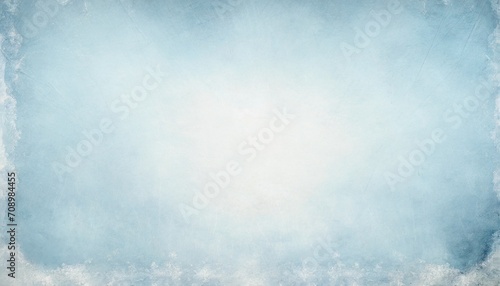 pastel blue background with soft blurred white center and faded old vintage texture border