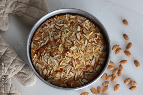 Almond buttermilk cake. A delicious cake adorned with a generous sprinkle of chopped almonds, perfect for tea time
