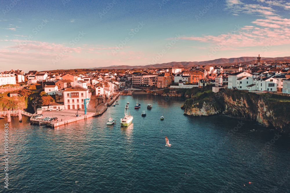 Aeral view of Tapia de Casariego, a small coastal town in Asturias, Spain. Beautiful fishing port with boats