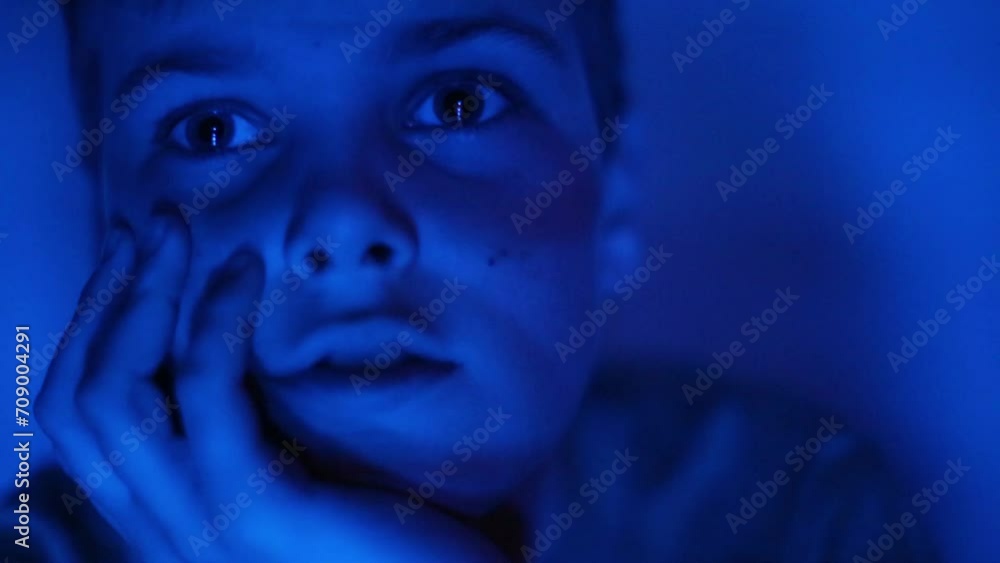 Close-up portrait of boy looking into camera in studio Close-up portrait of boy looking into camera in studio