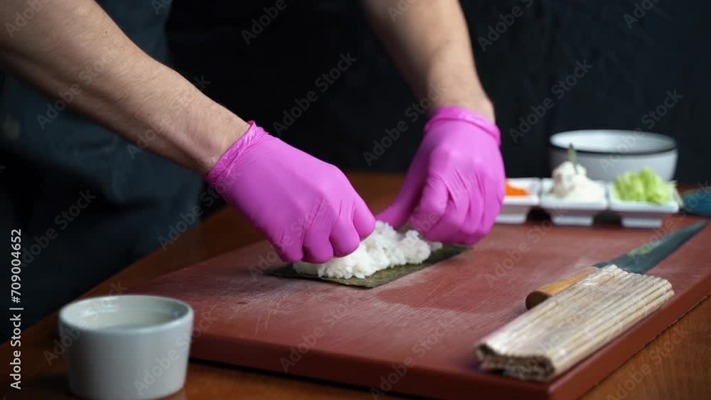 The process of making sushi in a restaurant The process of making sushi in a restaurant