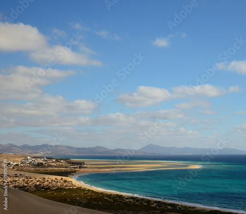 Beautiful Sotavento beach, blue sky and scattered clouds, southeast of Fuerteventura, Canary Islands, Spain