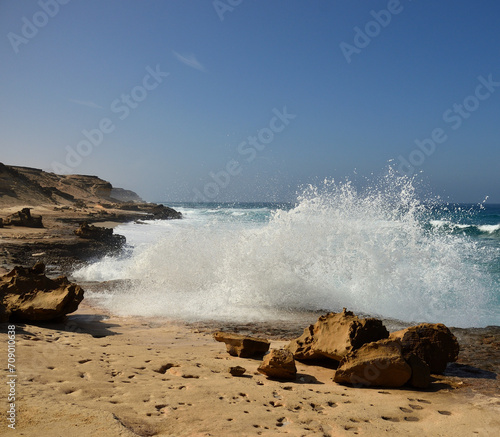 Waves breaking on the shore, wild beach of Agua Liques, natural reserve of Jandia, Fuerteventura, Canary Islands