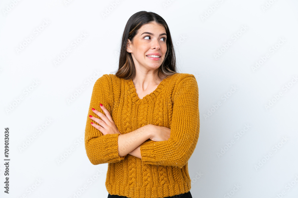 Young Italian woman isolated on white background making doubts gesture while lifting the shoulders Young Italian woman isolated on white background making doubts gesture while lifting the shoulders