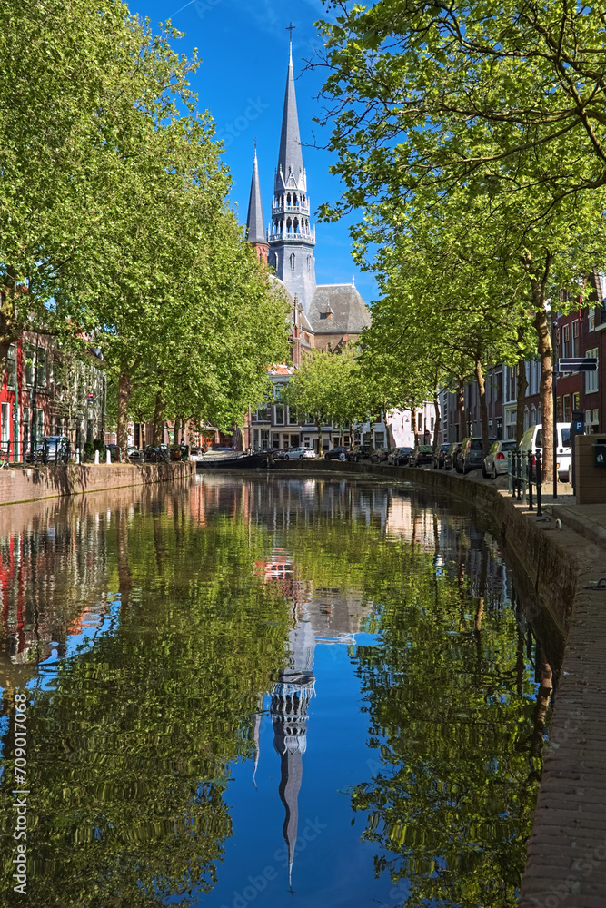 Gouda, Netherlands. View of Gouwekerk (formerly Sint-Jozefkerk, St. Joseph's Church) from Gouwe river. The church was built in 1902-1904 by design of architect Christianus Petrus Wilhelmus Dessing.