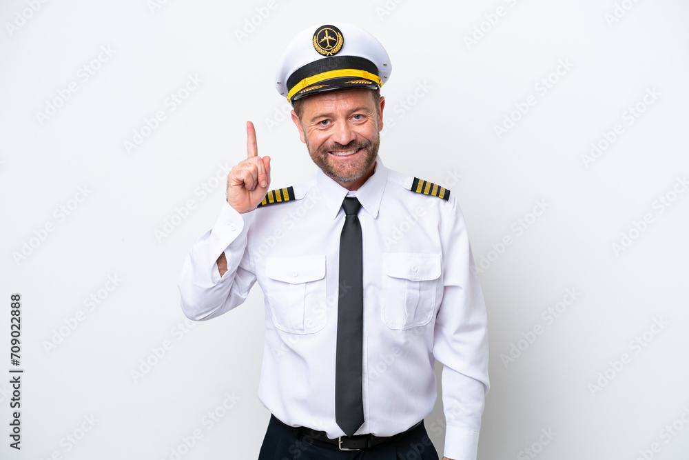 Airplane middle age pilot isolated on white background pointing with the index finger a great idea